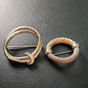 Gold and Silver Brooch Set